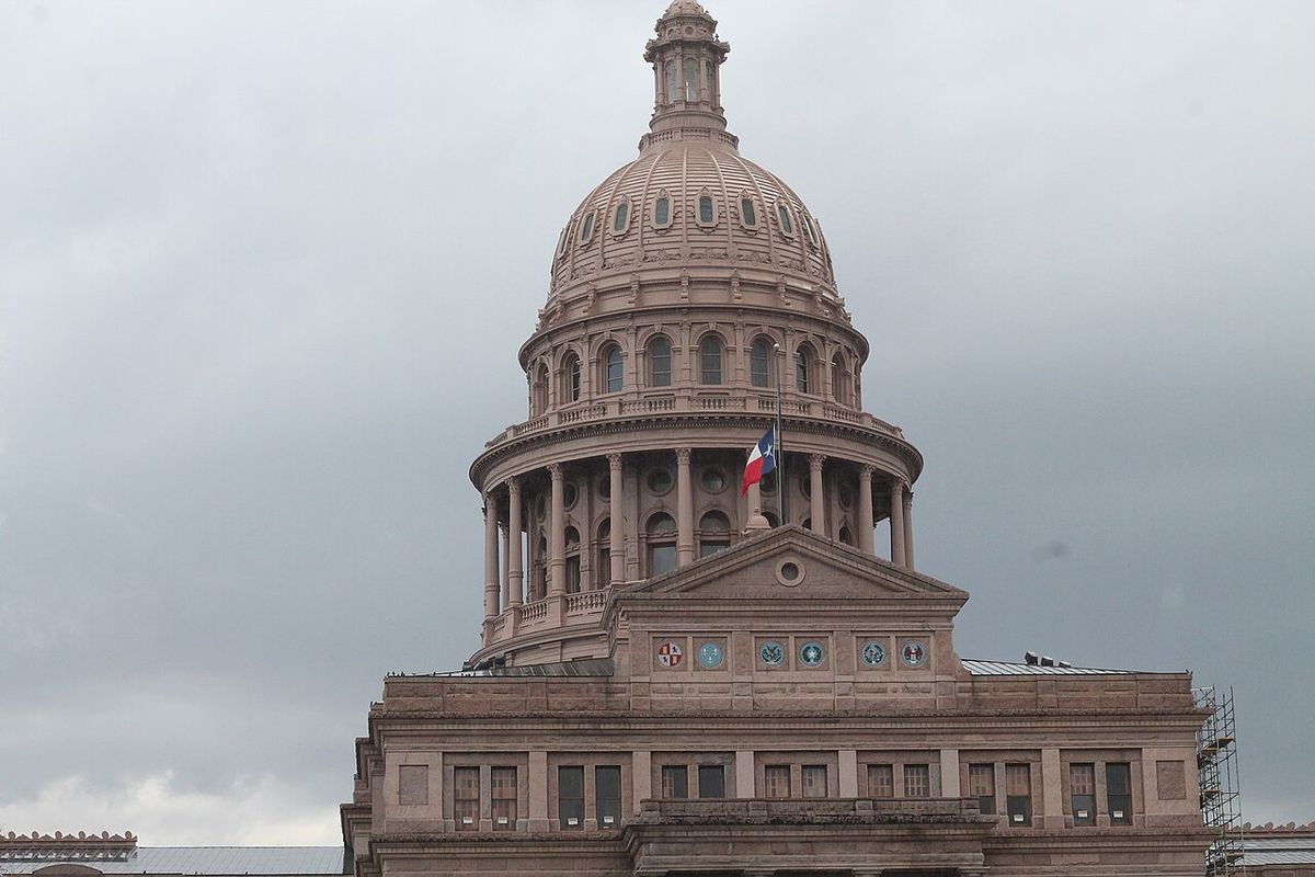 The dome of the Texas State Capitol against a blue sky